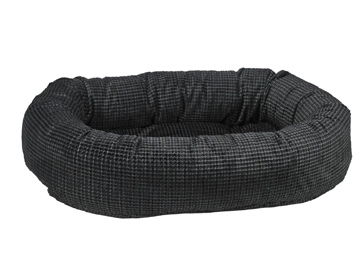Dog bed with a checkered pattern on a white background