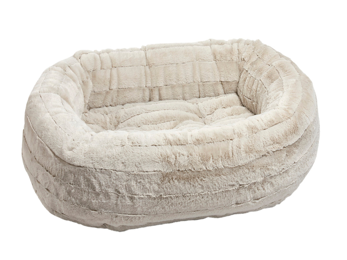 Cream Beige pet bed with a soft texture on a white background