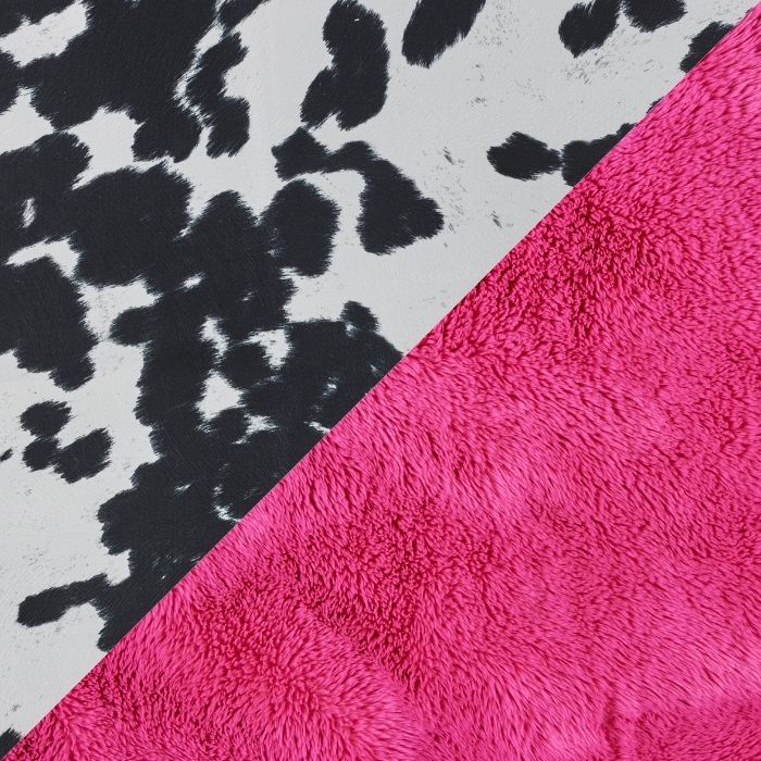 A close-up of a textured fabric or faux-fur material shown diagonally, split into two sections: one side features a black and white cow print pattern, and the other side is a solid bright hot pink.